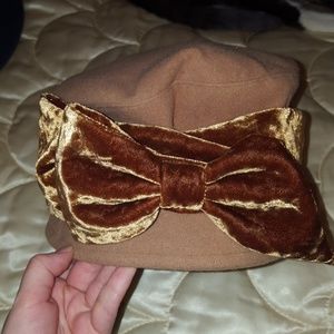 90s style camel colored bucket hat with velvet bow